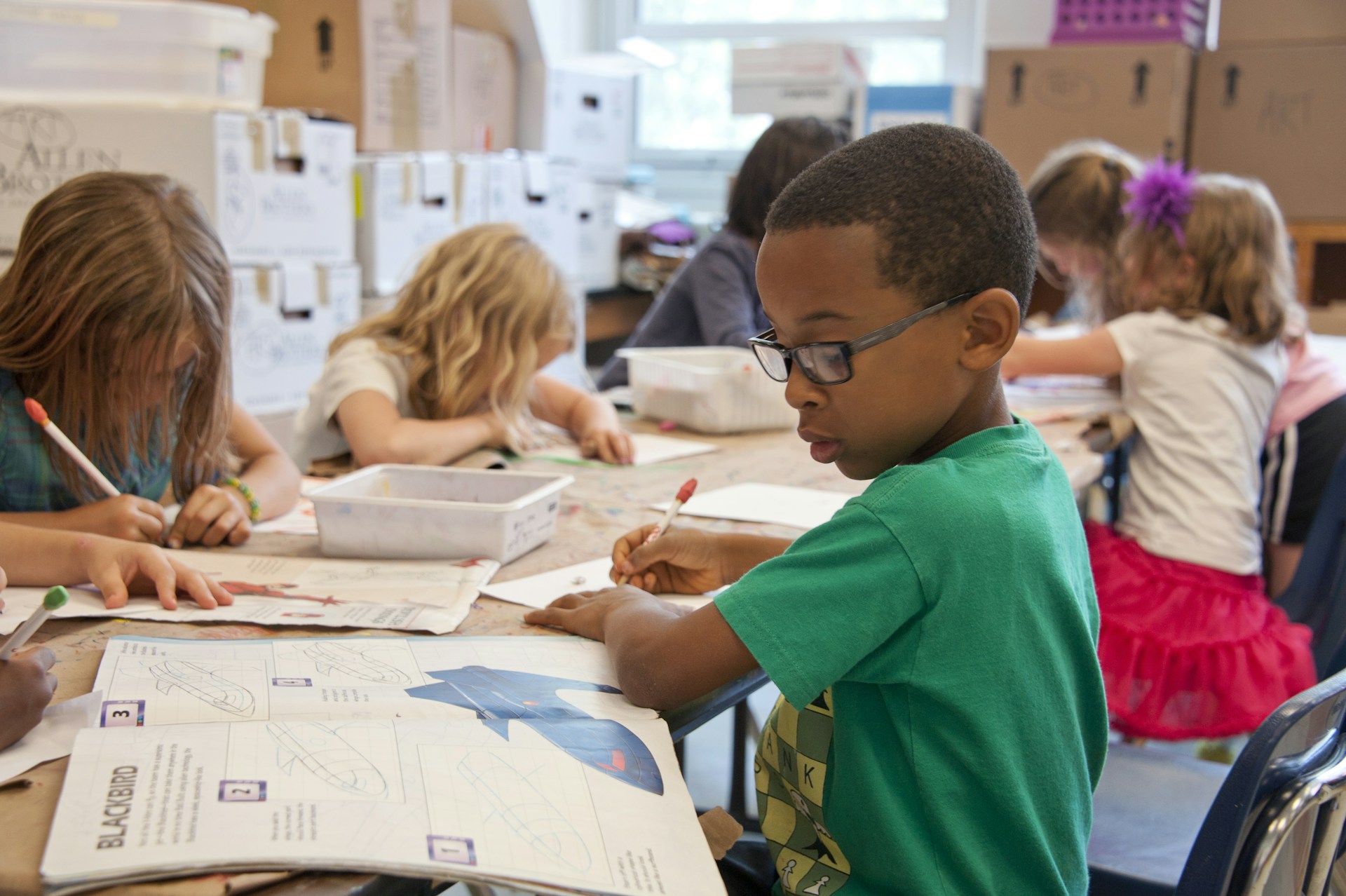 A student focused on schoolwork