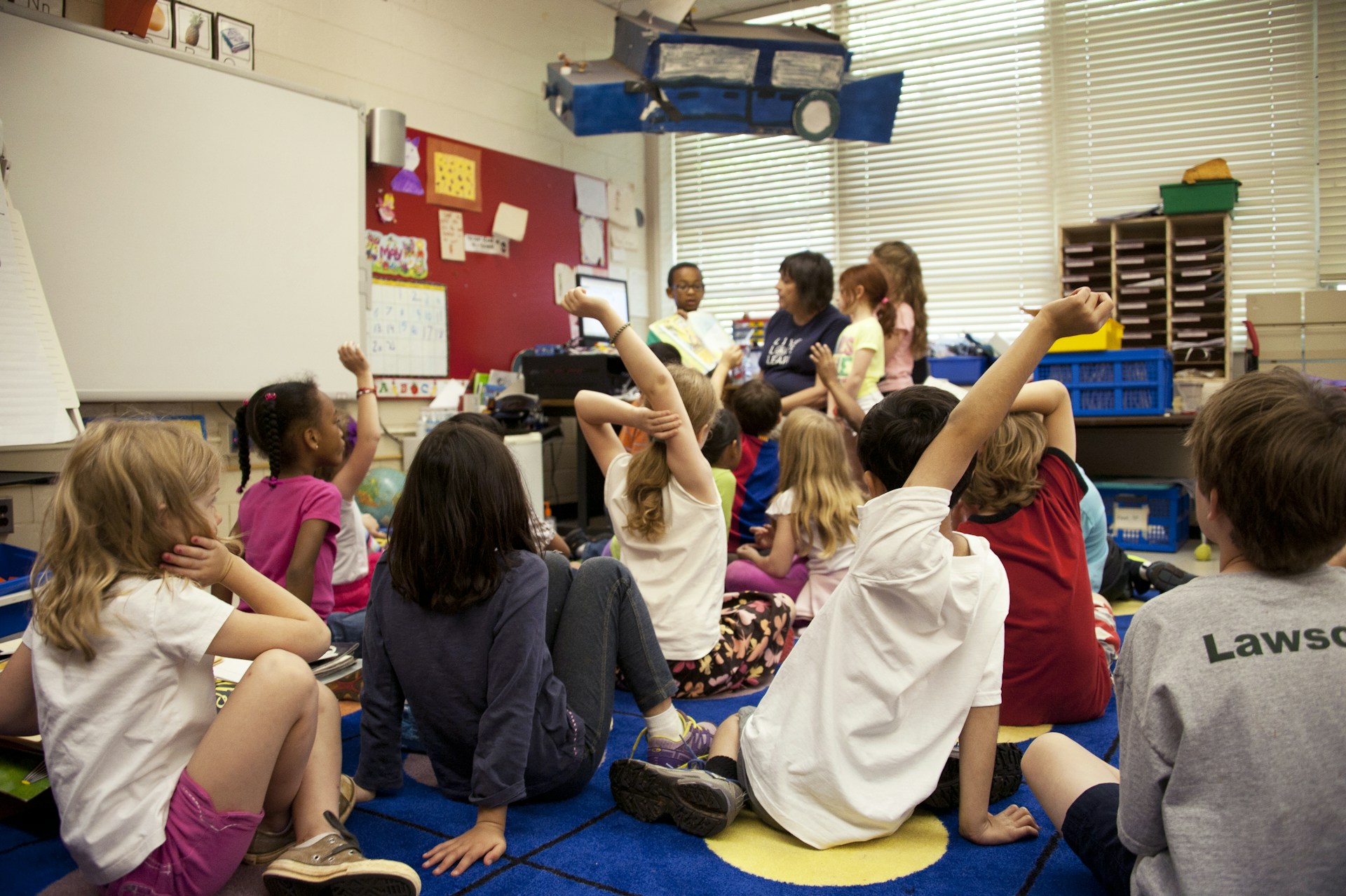 Students learning together in a classroom setting